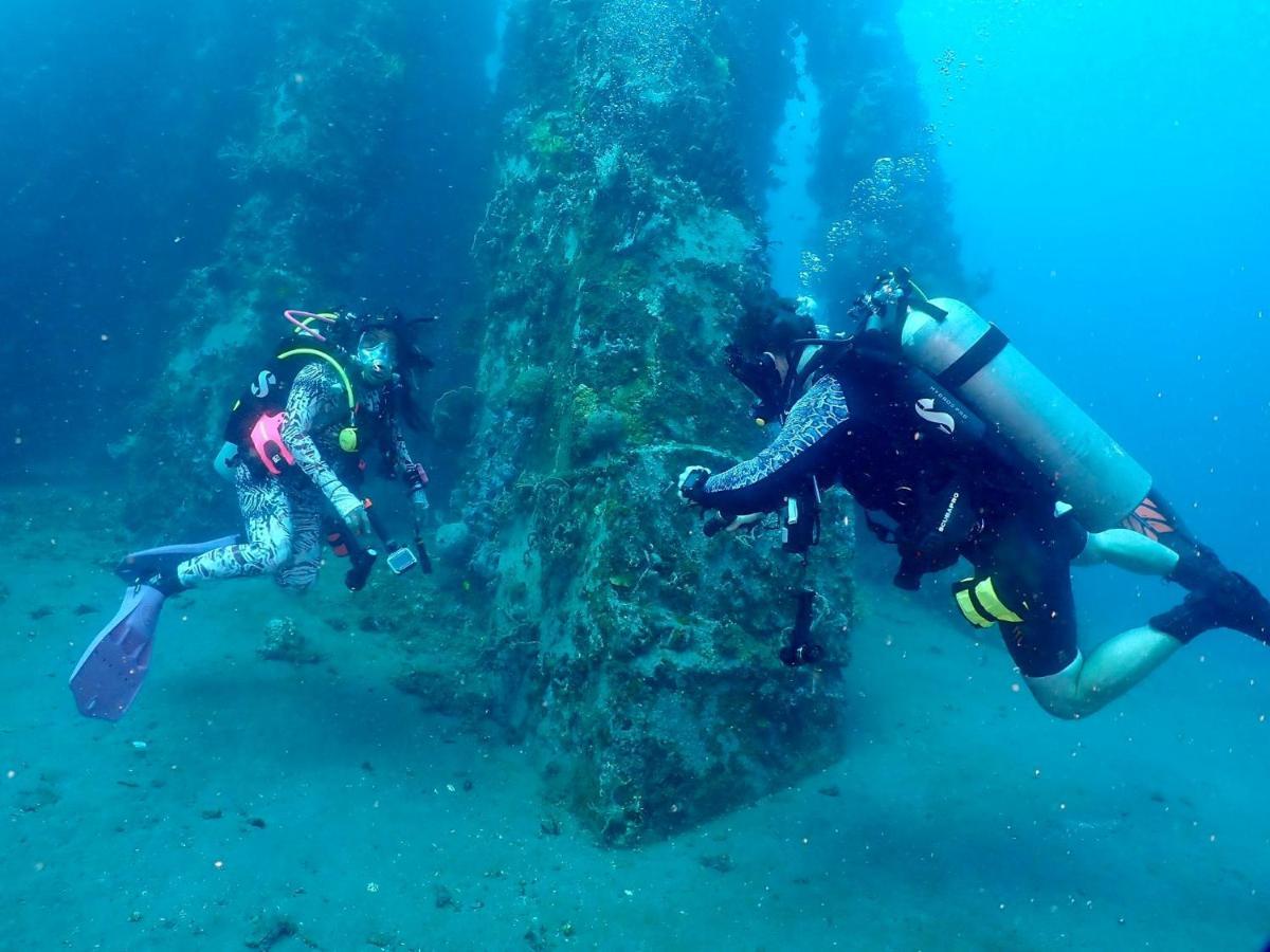 Infinity Diving Resort And Residences Dauin Bagian luar foto