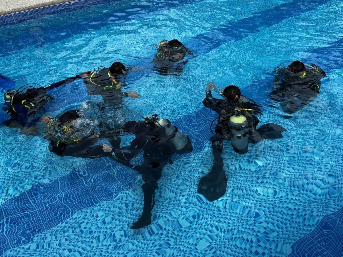 Infinity Diving Resort And Residences Dauin Bagian luar foto