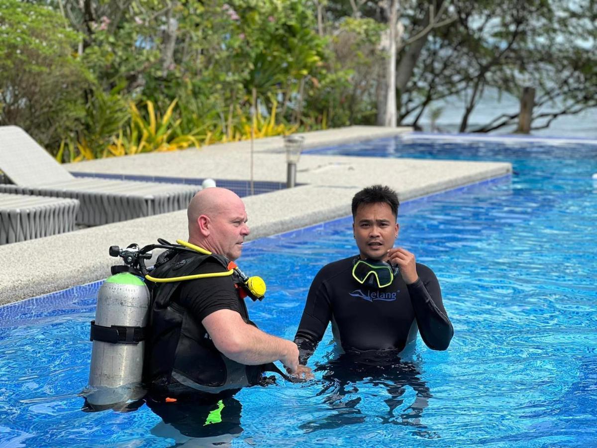 Infinity Diving Resort And Residences Dauin Bagian luar foto