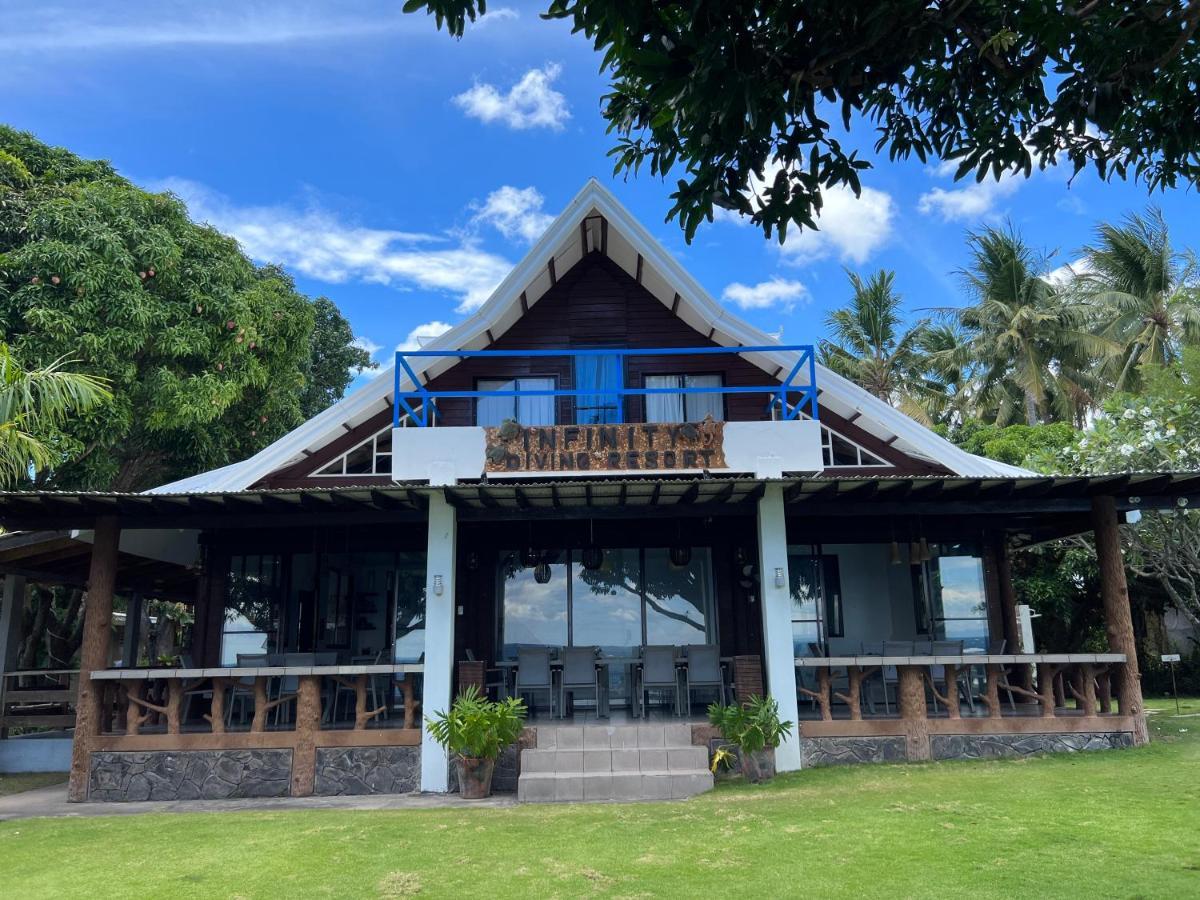 Infinity Diving Resort And Residences Dauin Bagian luar foto